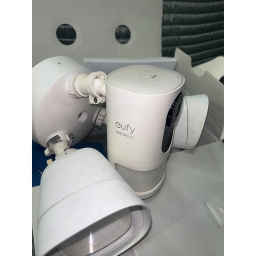 72 - Two Eufy Security Smart Home Devices Including 2K Video Doorbell and Floodlight CameraA group of E... 