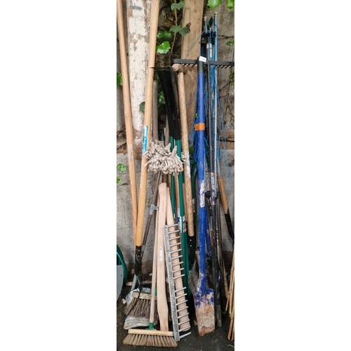 84 - An Assortment of Garden, Groundskeeping, and Landscaping ToolsAn assortment of long-handled utilit... 
