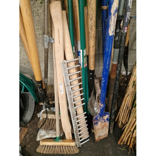84 - An Assortment of Garden, Groundskeeping, and Landscaping ToolsAn assortment of long-handled utilit... 