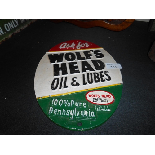 144 - Cast wolf head oil sign