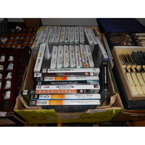 24 - Box of DS games etc