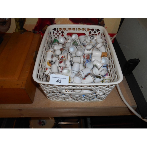 43 - Basket of collectable thimbles