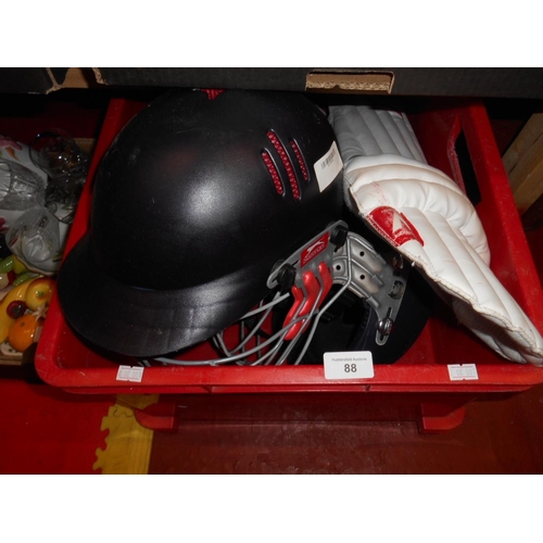 88 - Box of cricket hats etc