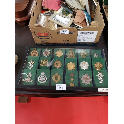 266 - Selection of military cap badges etc