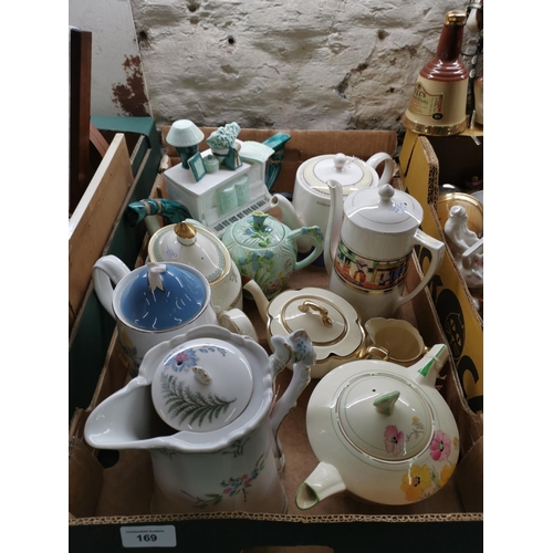 169 - Box of collectable tea pots