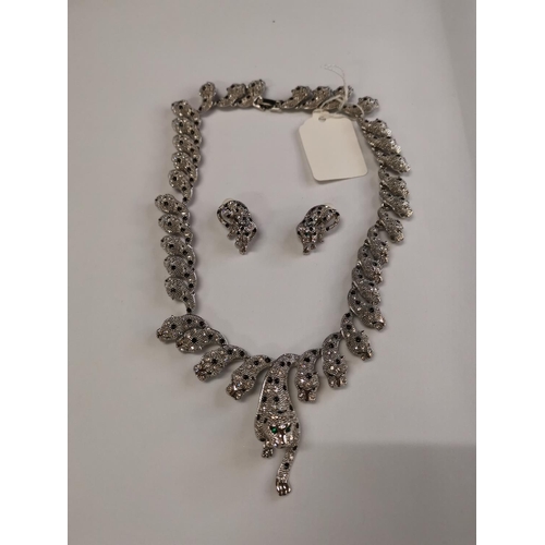 246 - Snake and leopard necklace and earrings