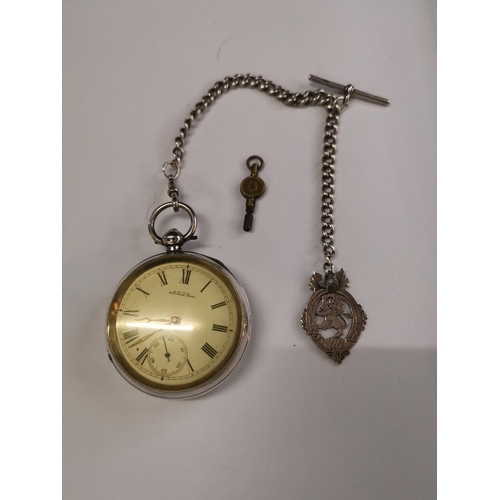 250 - Chester silver Waltham pocket watch chain and fob- dated1917- working order with key