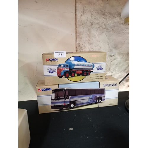 143 - 2 boxed Corgi bus and truck