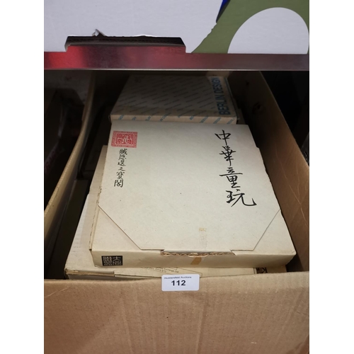 112 - Large box of picture plates