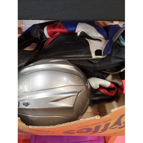 109 - Motorbike helmet and leathers