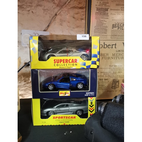 156 - 3 boxed toy sports cars