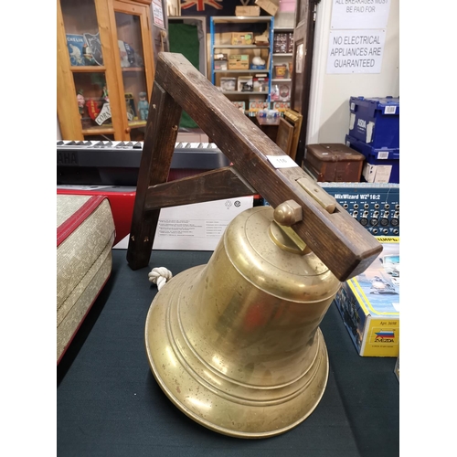 116 - Large brass bell with its clanger