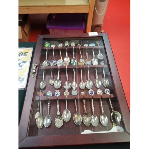 156 - Display case of collectable souvenir spoons