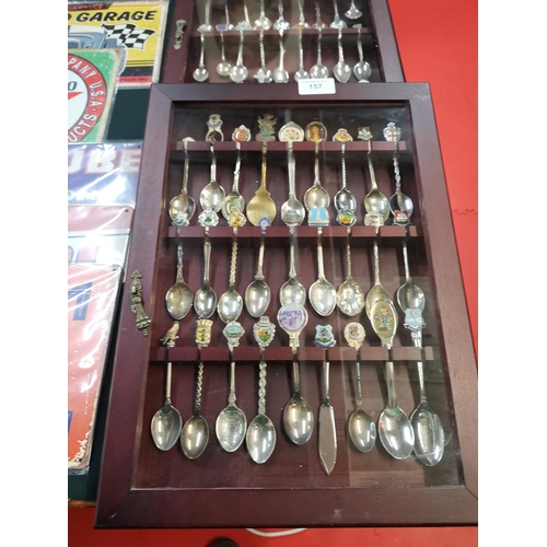 157 - Display case of collectable souvenir spoons