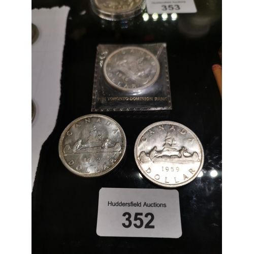 352 - 3 silver Canadian dollars 59/66/62