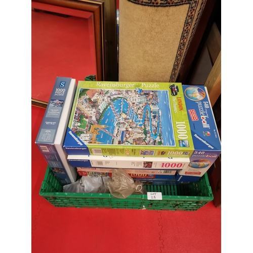 25 - Box of jigsaws