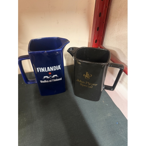 23 - 2 Ceramic Water Jugs john player special