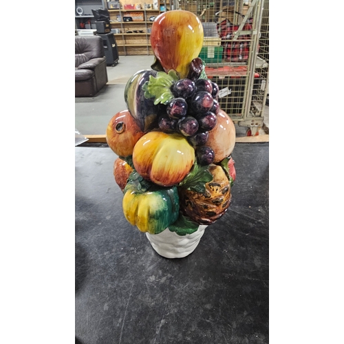 65 - Ceramic Collection of Fruit OrnamentStands approximately 13 inches in height.Good condition... 