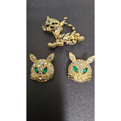 170 - 3 x Beautiful Cat Brooches, Gold Coloured Metal with various coloured glass Gems.