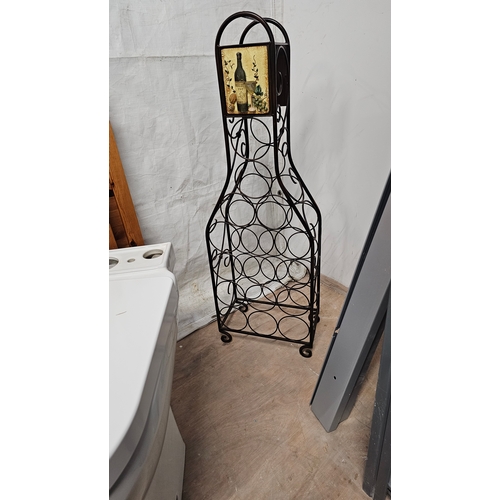 237 - Wine bottle shaped wine rack, holds 14 bottles and stands a metre tall