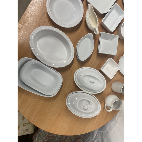 243 - Large White Crockery Cooking & Serving Set. 39 Pieces In Total.3x Large Serving Dishes With Lid2... 