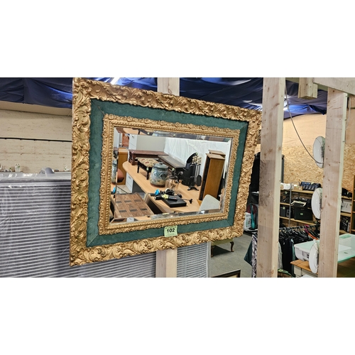 102 - Antique Rectangular Giltwood MirrorGold Coloured ornate frame with Green inner boarder with the mirr... 