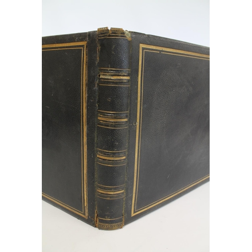 209 - PHOTOGRAPHS. 19th century large folio photograph album in black gilt morocco leather depicting views... 