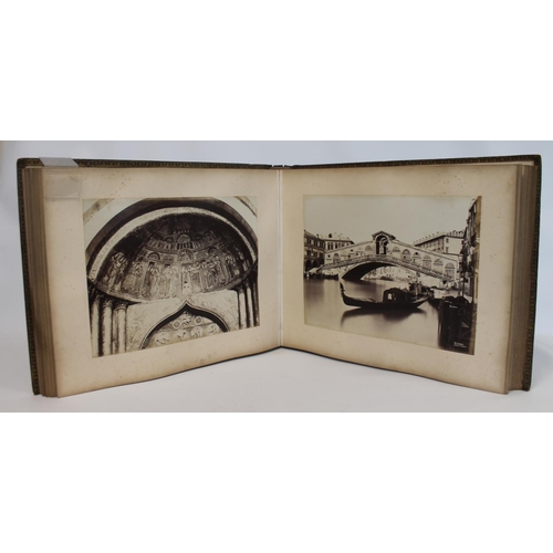 209 - PHOTOGRAPHS. 19th century large folio photograph album in black gilt morocco leather depicting views... 