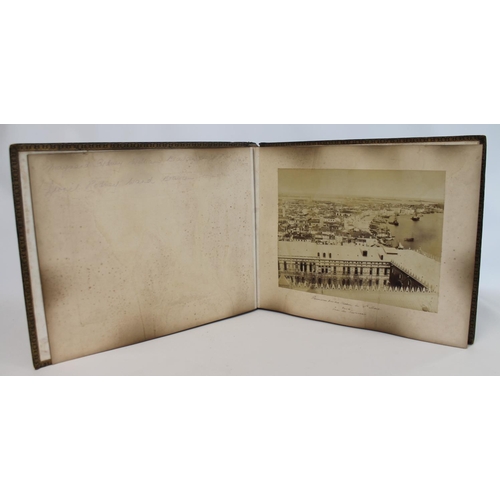 209 - PHOTOGRAPHS. 19th century large folio photograph album in black gilt morocco leather depicting views... 