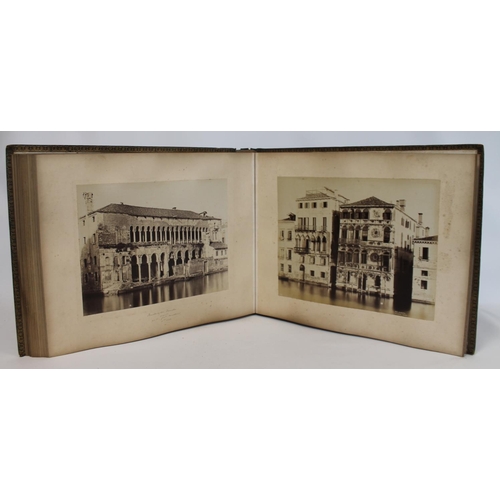 209 - PHOTOGRAPHS. 19th century large folio photograph album in black gilt morocco leather depicting views... 