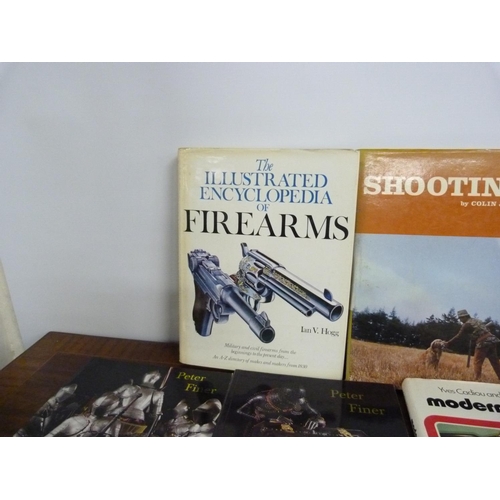 22 - <strong>Firearms & Weapons.</strong> 9 various vols....