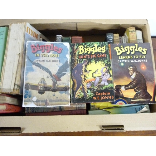 69 - JOHNS W. E. A carton of Biggles Books, varying cond.