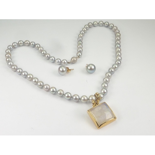 117 - Single row necklace of grey cultured pearls with labradorite set drop in 18ct gold, with pearl.