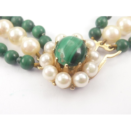 118 - Necklace with malachite and cultured pearls on similar oval 9ct gold snap.