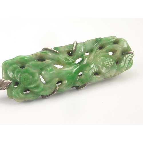 33 - Chinese carved jadeite suretee pin with two panels in sizes, in white gold, now fixed.