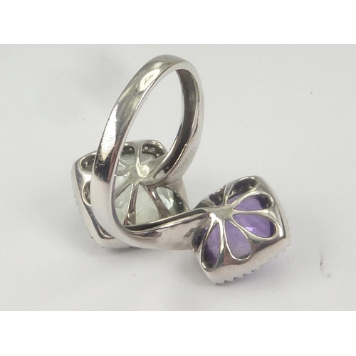 38 - Cross over ring with amethyst and pale aventurine quartz collets, each with tiny diamonds, in sizes,... 