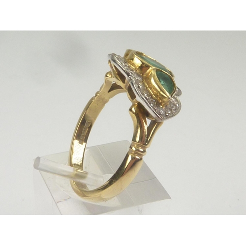 41 - Three stone ring with an oval emerald flanked by two other of pear shape surrounded by diamonds in 1... 