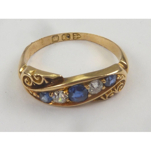 44 - Victorian five stone diamond ring with graduated scroll setting, 18ct gold circa 1890 with box. Size... 