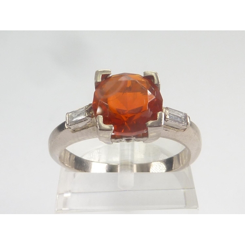 72 - Fire opal and diamond ring in white gold, probably 9ct and a paste sapphire cluster ring, 9ct white ... 