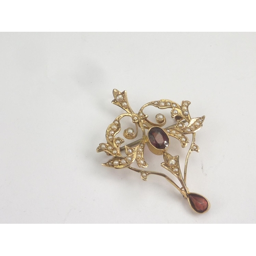 75 - Two Edwardian gold openwork pendants, pearl and garnet in gold, one '9ct'