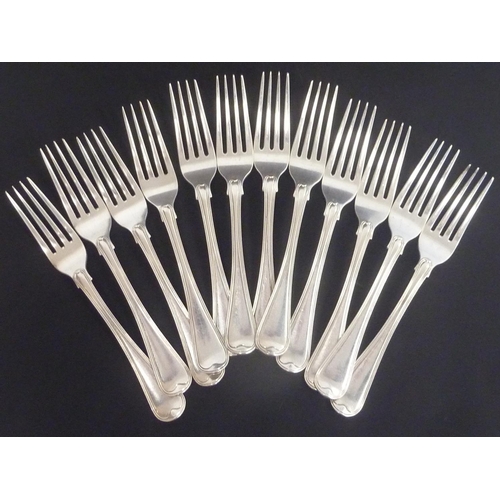 87 - Set of twelve silver table forks of winged reeded old English pattern by Eley & Fearn 1816.