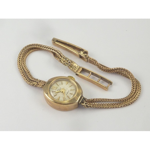 9 - Lady's Elco 9ct gold bracelet watch.