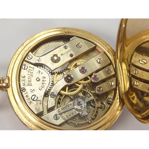 6 - Tiffany, gold and enamel level watch, nickelled movement jewelled to the centre, with wolf's tooth w... 