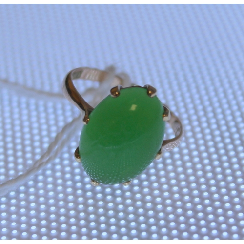 11 - Chinese chrystophase ring with oval cabochon in gold. Size 'J'.