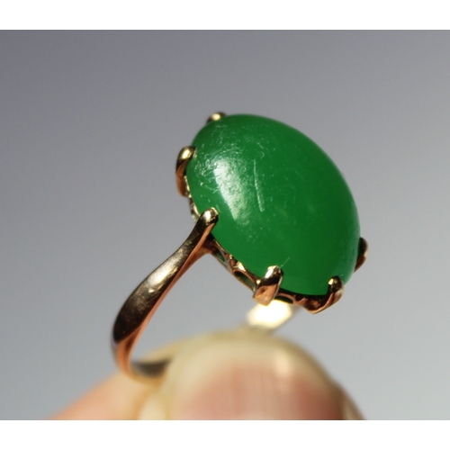 11 - Chinese chrystophase ring with oval cabochon in gold. Size 'J'.