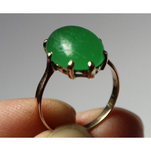 11 - Chinese chrystophase ring with oval cabochon in gold. Size 'J'.