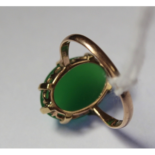 11 - Chinese chrystophase ring with oval cabochon in gold. Size 'J'.