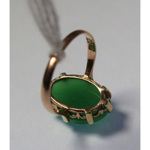 11 - Chinese chrystophase ring with oval cabochon in gold. Size 'J'.