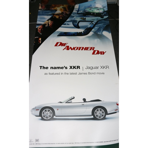 244 - Two Jaguar James Bond Die Another Day (2002) Jaguar XKR advertising banners, 2m x 1m.