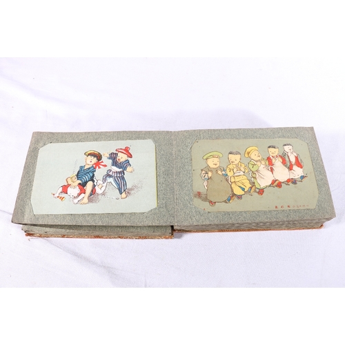 252 - Two albums containing approximately 180 early 20th century Japanese postcards, most are humorous alt... 